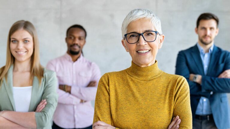 4 people smiling